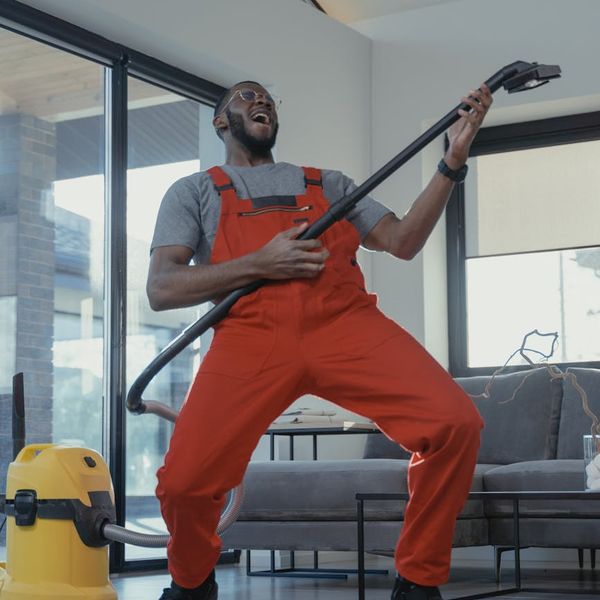 Woman feeling energetic and full of life in a bright room.